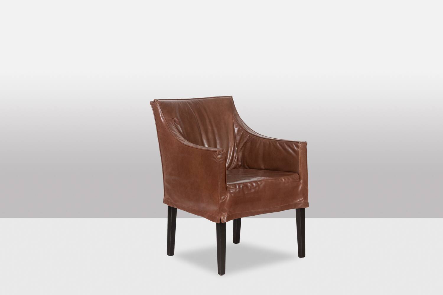 Lintello. Pair of camel leather armchairs. 1970s.