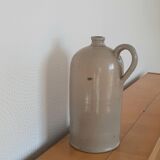Bouteille ancienne en grès avec anse
