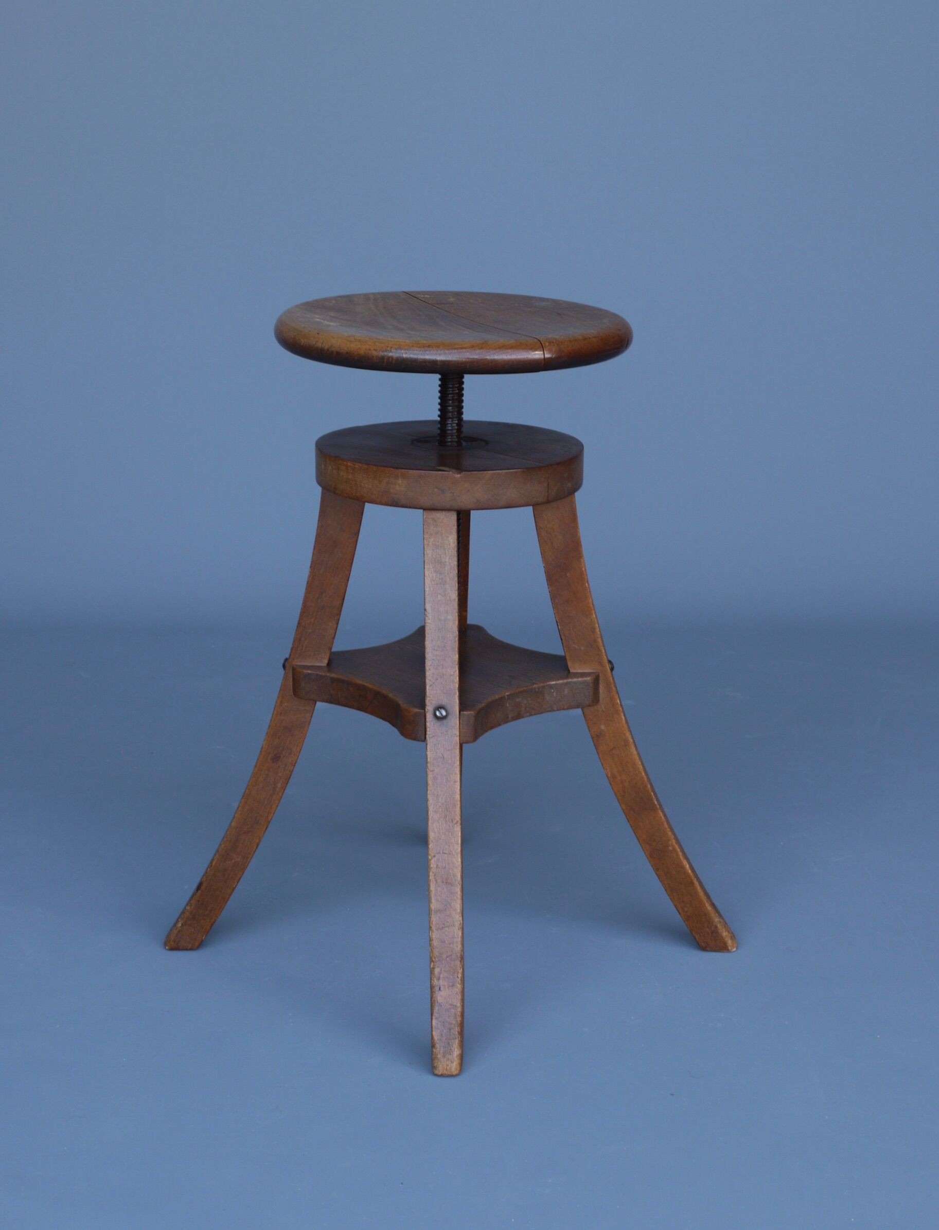 Industrial adjustable piano stool. 1930s