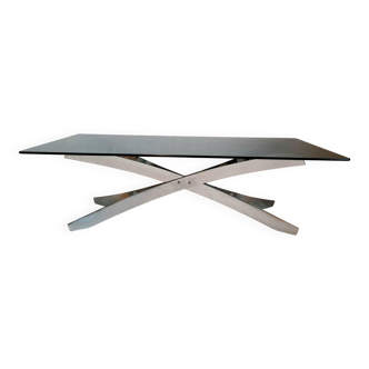 Space age coffee table in steel and smoked glass.