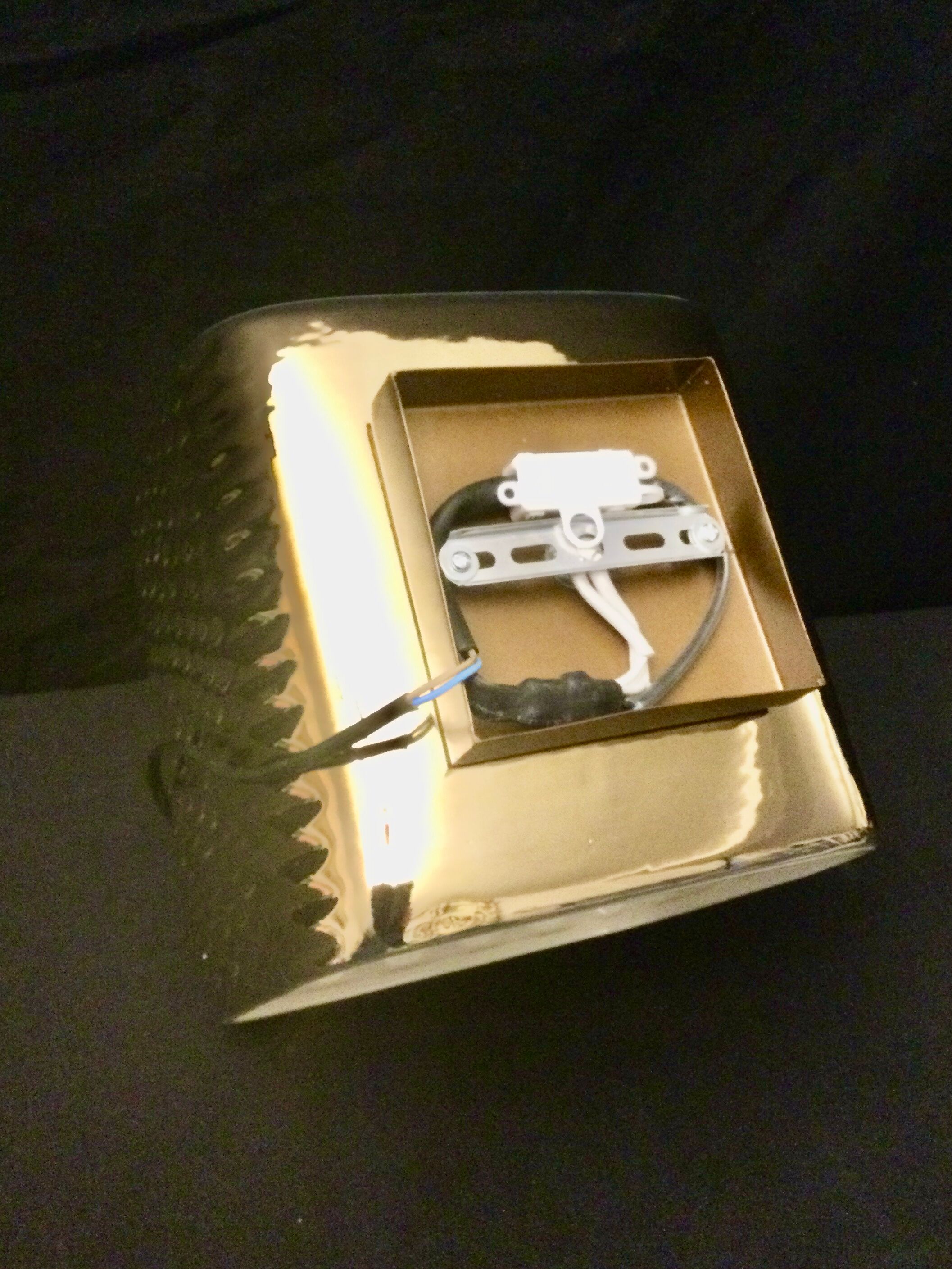 Golden ceramic cube wall light