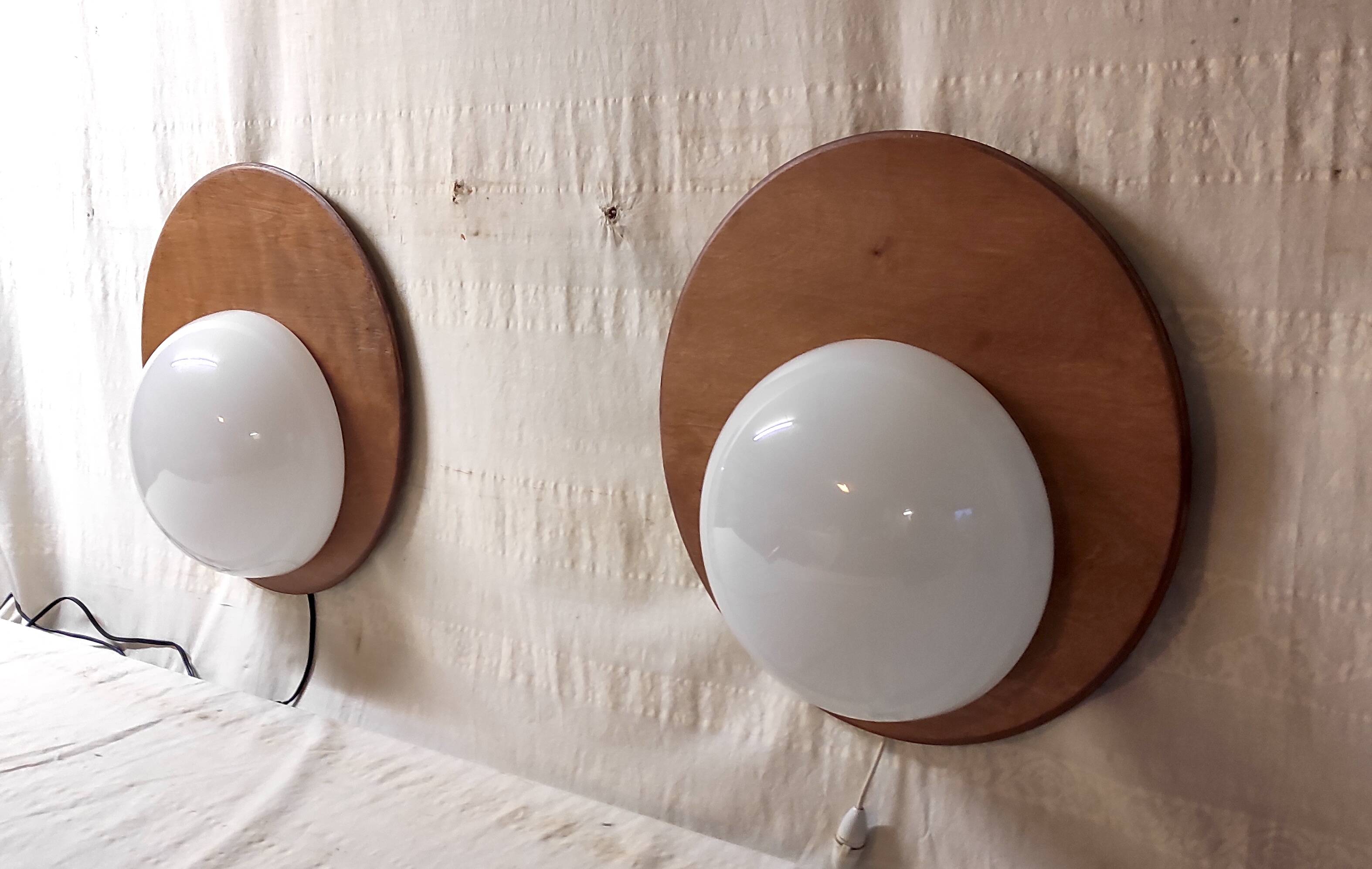 Designer wall lights in wood and opaline globe - mid-20th century