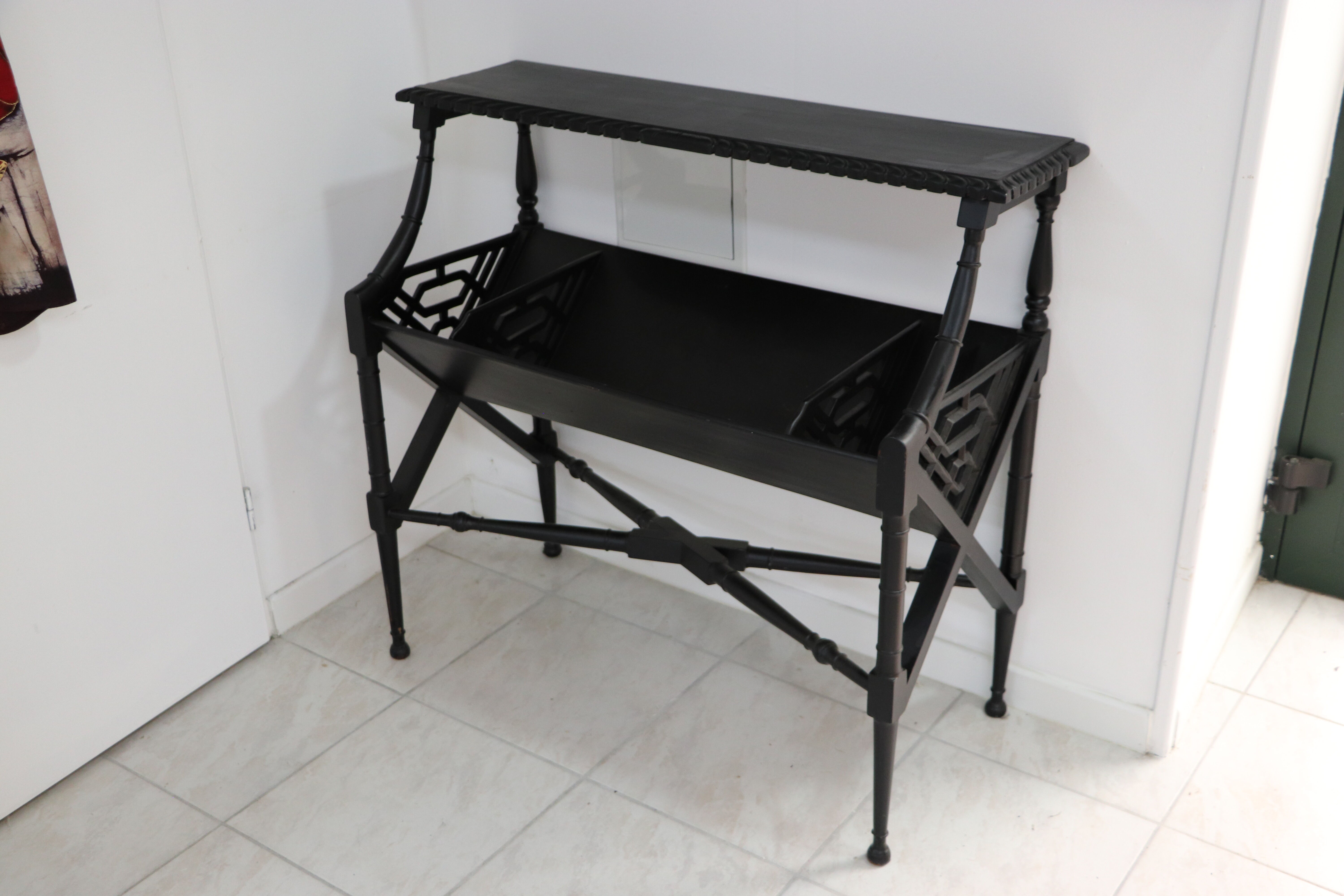 Black lacquered Indochinese console with disk storage