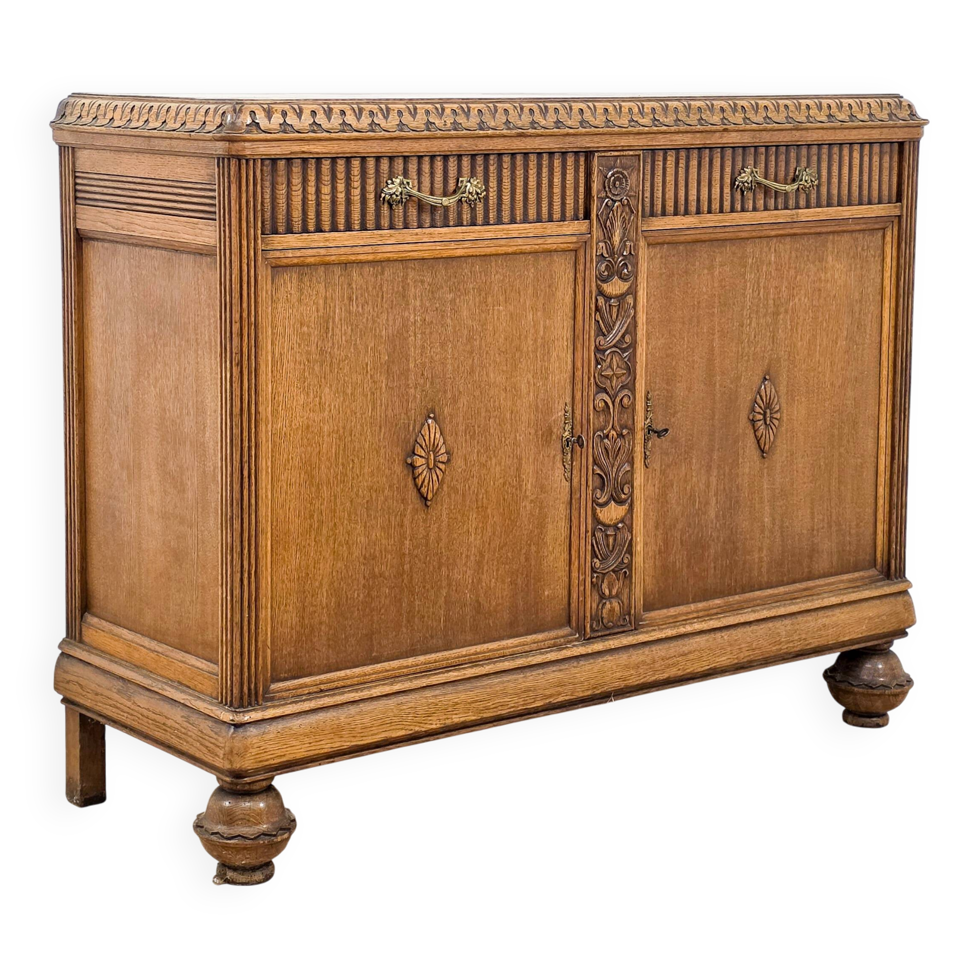 Elegant carved oak sideboard in Renaissance style from the 1930s