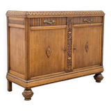 Elegant carved oak sideboard in Renaissance style from the 1930s