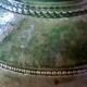 Ancient vase in glazed terracotta with green glaze.