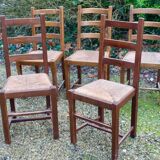 Suite of 17 straw chairs with high backs