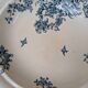 Shallow round plate Boch Frères model Regent with arabesque and foliage decoration.