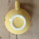 Vintage yellow ceramic milk jug