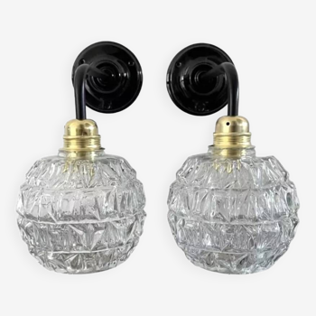 Pair of chiseled glass wall sconces