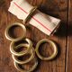 Lot of 6 patinated golden metal towel rings