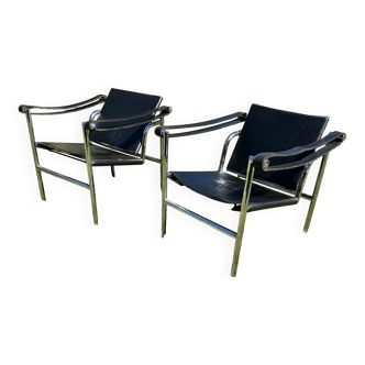 Pair of leather and steel armchairs