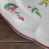 Large round dish KG Lunéville Reverbère, earthenware from the East, floral decoration.