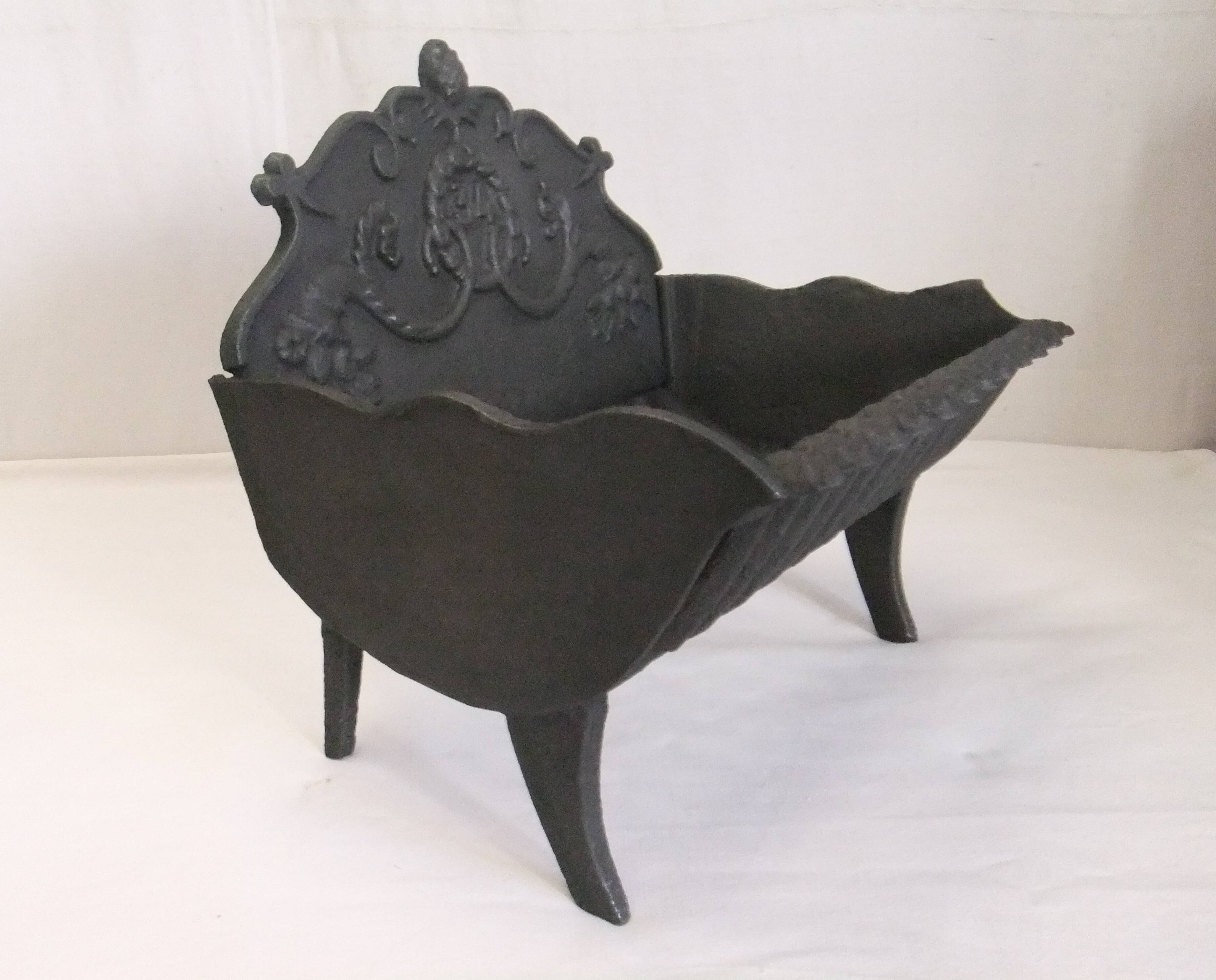 Old cast iron log holder andiron fireplace cornucopia pine cone