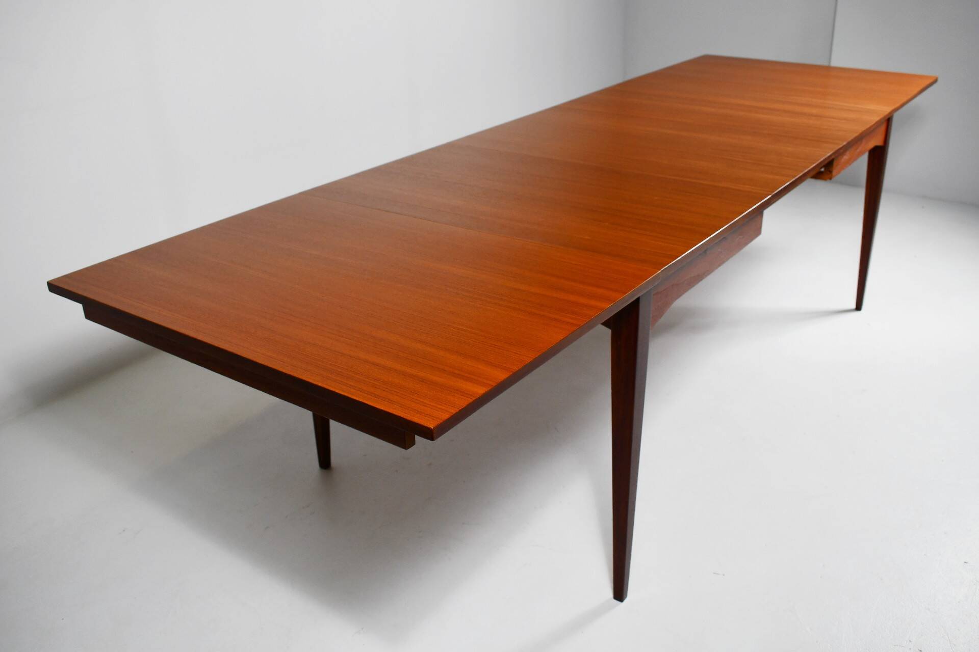 Large teak dining table. 1960s.