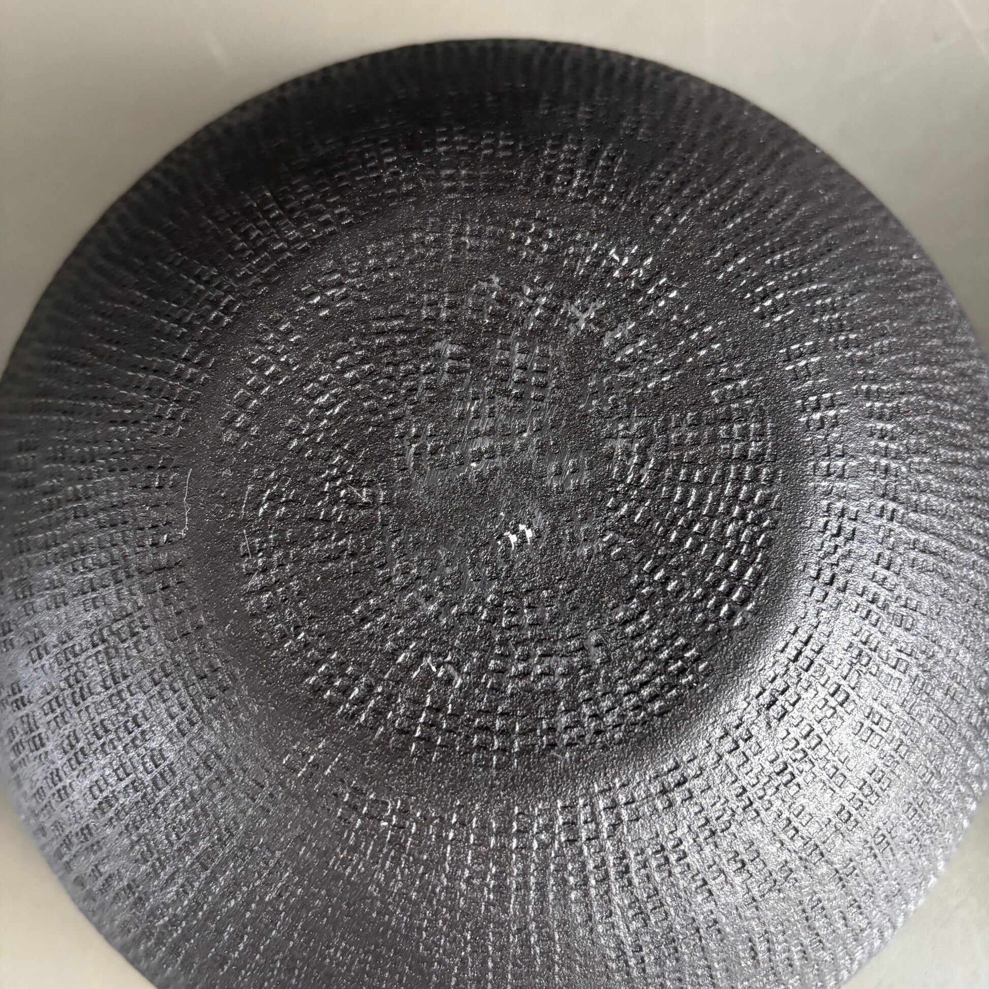 Pair of black lacquered metal catchall bowls