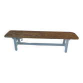 Vintage bench with patinated pearl gray base, wooden seat.