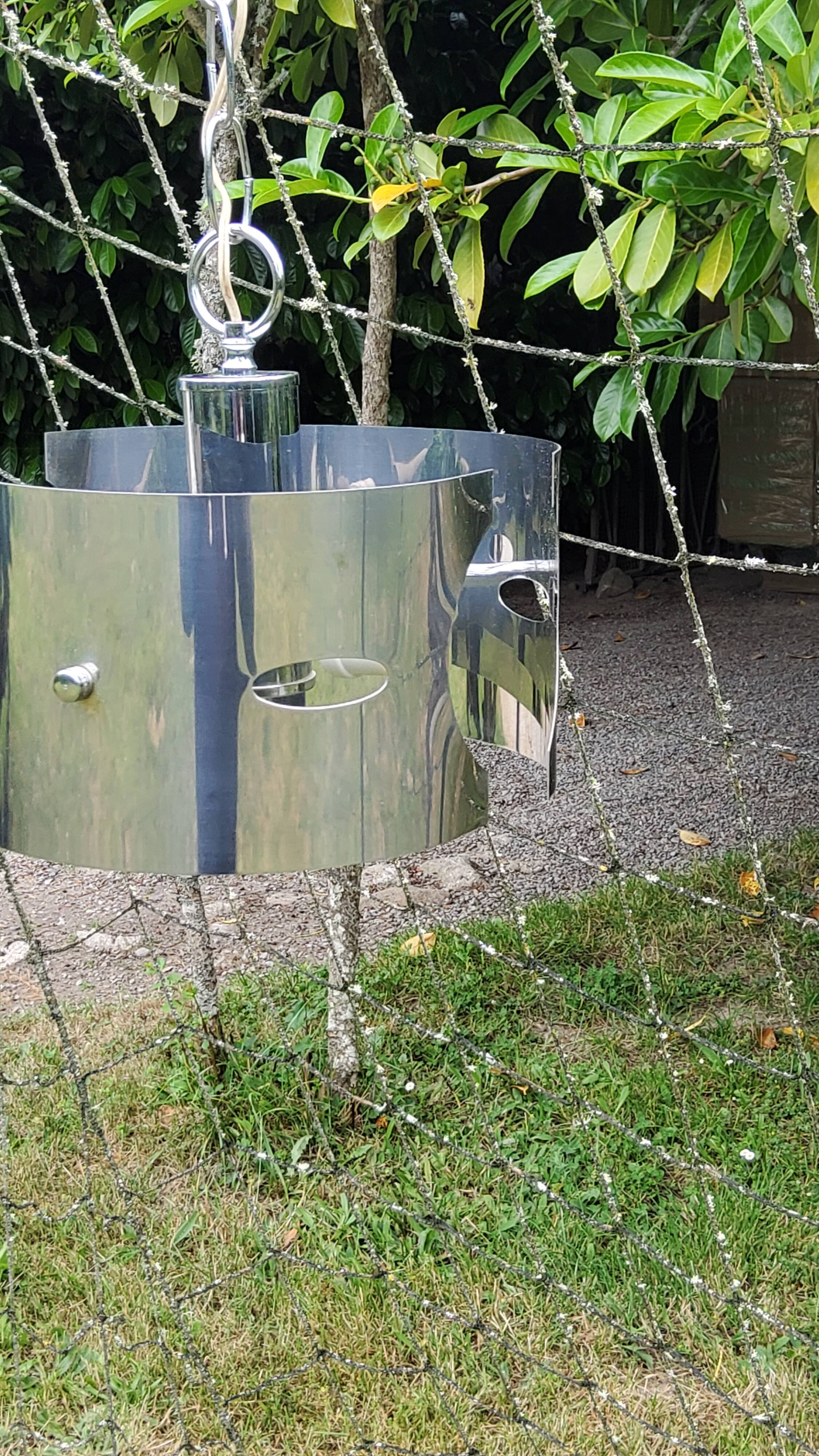 Design chandelier of the 70s in chromed metal