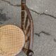 Vintage 19th-century bistro chair made of curved solid wood and caned in the Thonet style.