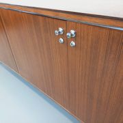 Vintage modernist enfilade in rosewood and chrome metal from the 60s and 70s.