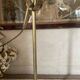 Large vintage lamp in brass with a pink opaline shade.
