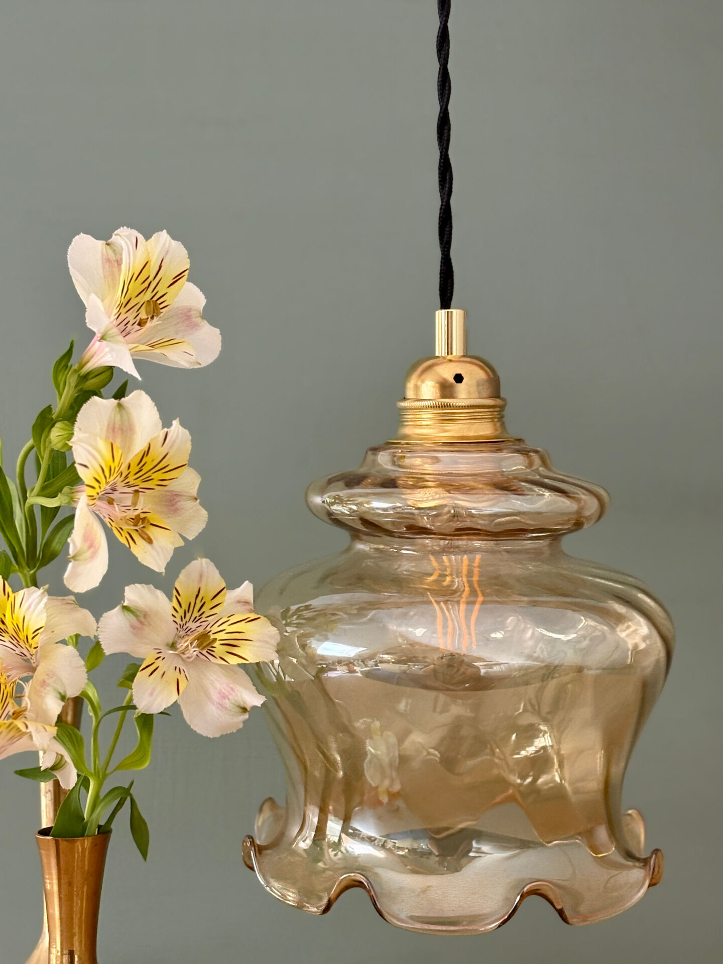 Vintage amber glass suspension globe
