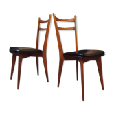 Paire de chaises pieds compas et skai noir