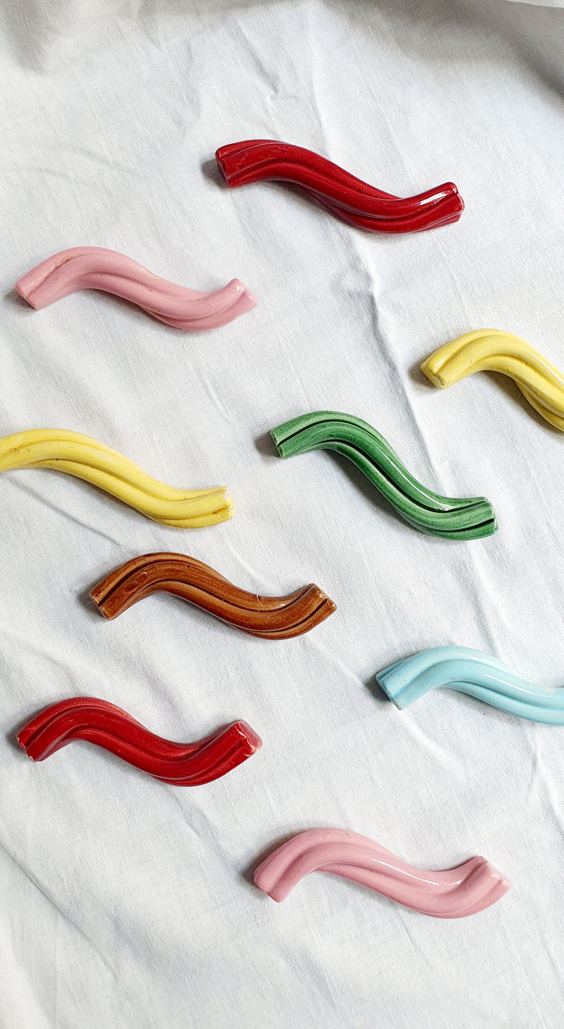 Set of 9 enamelled ceramic knife holders