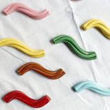 Set of 9 enamelled ceramic knife holders