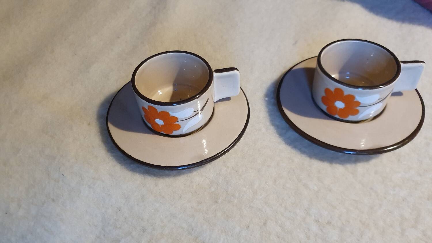 2 vintage ceramic cups and saucers