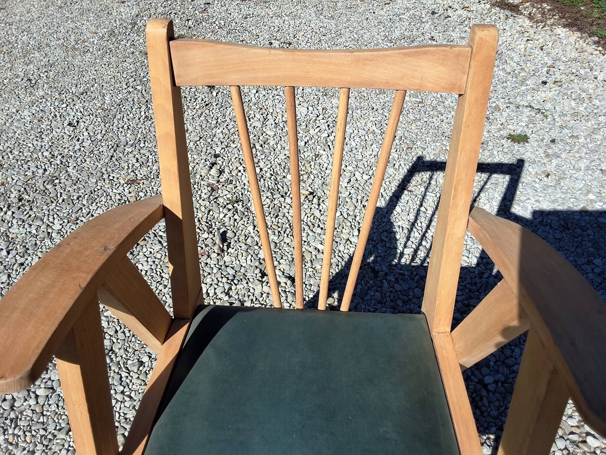 Compass leg armchair