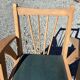 Compass leg armchair