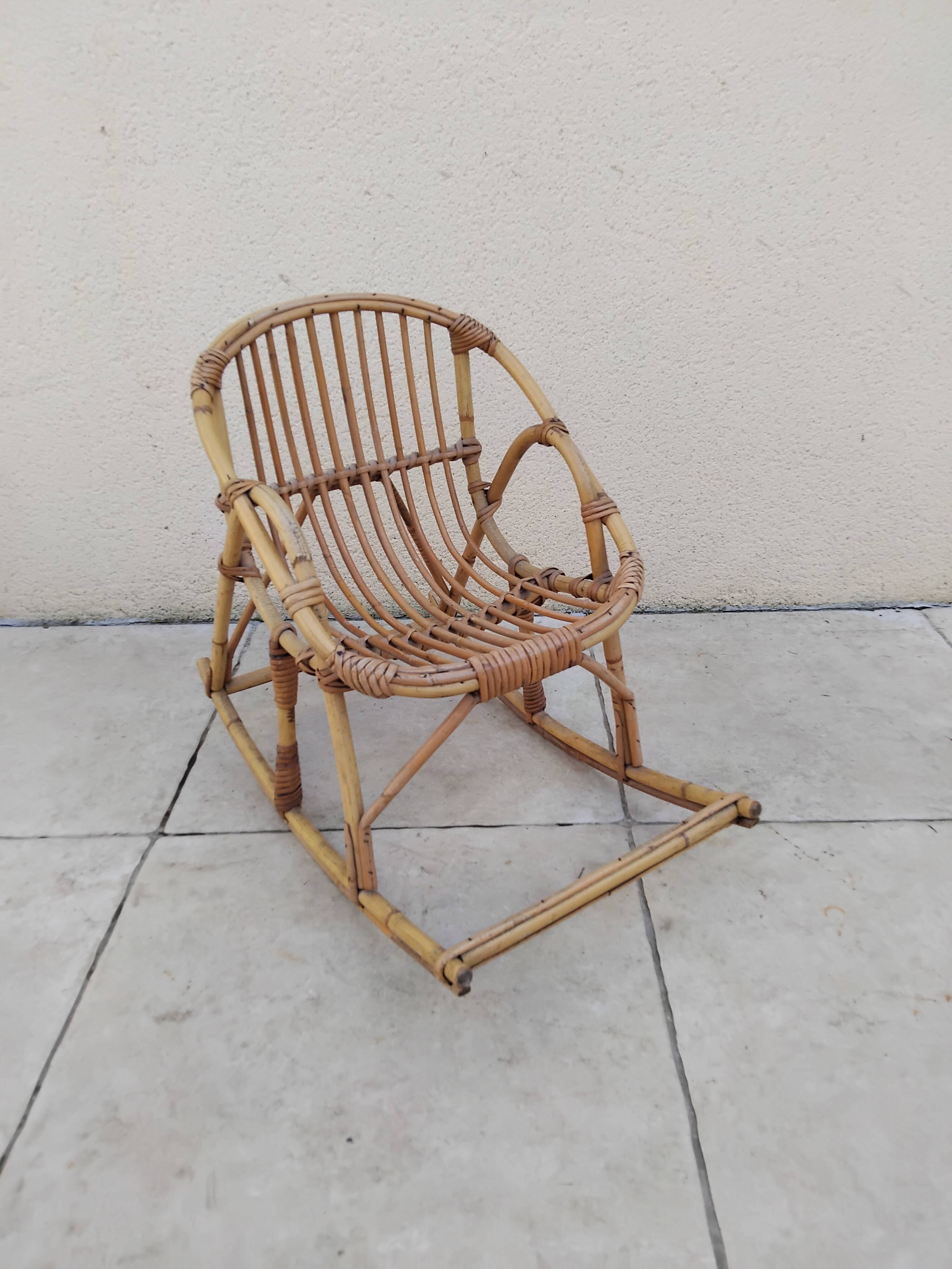 Vintage children's rattan rocking chair