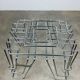 Chrome metal magazine rack or vinyl holder from the 70s.