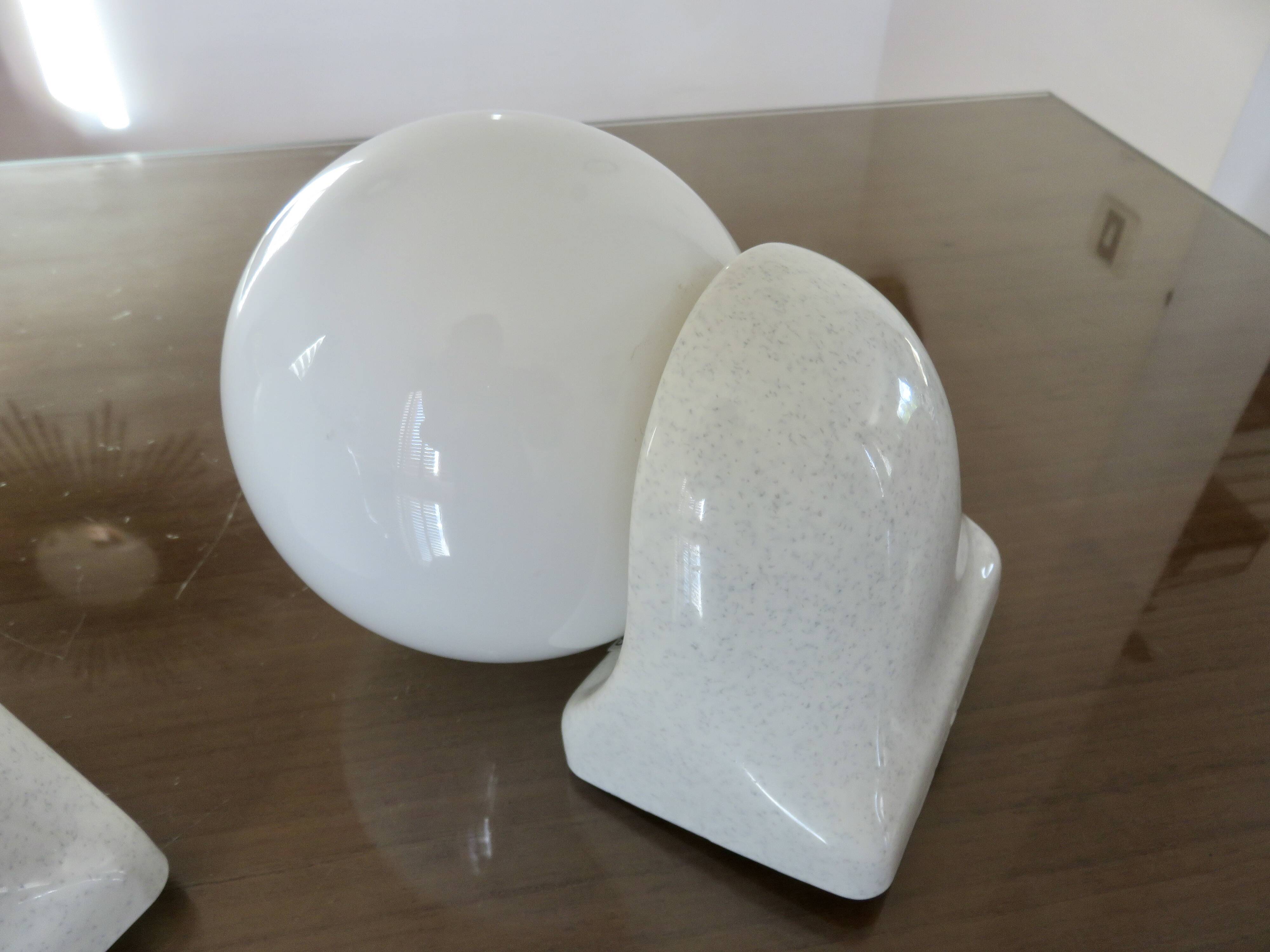 Pair of streamline opaline wall lights from the 80s