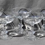9 old champagne glasses in flat-waisted blown glass