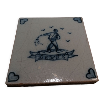 Old 18th century Delft tile