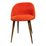 Orange furry barrel chair