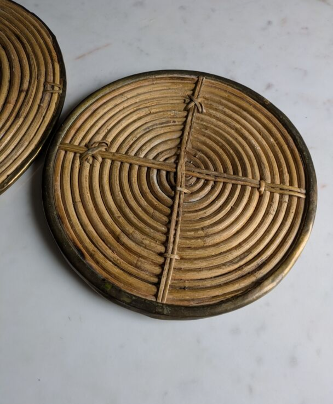 Rattan trivets attributed to Gabriella Crespi.