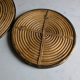 Rattan trivets attributed to Gabriella Crespi.