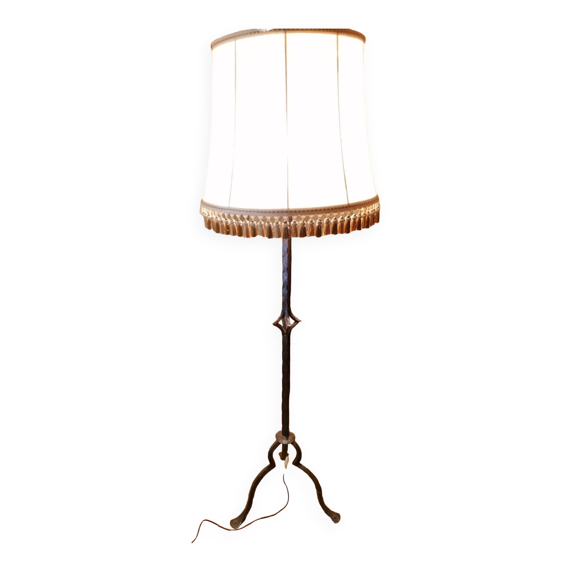 Wrought iron floor lamp.