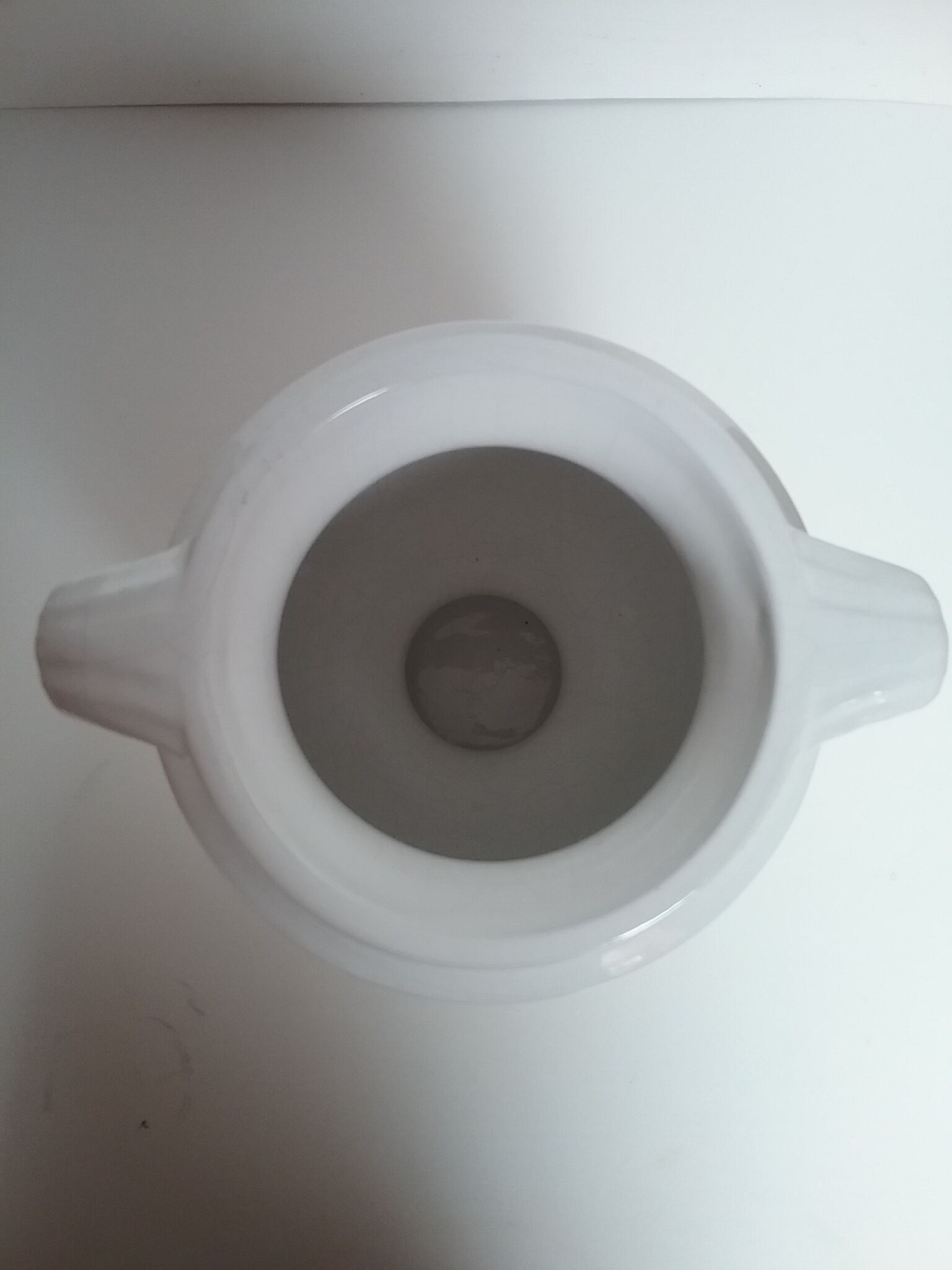 Cracked white ceramic vase