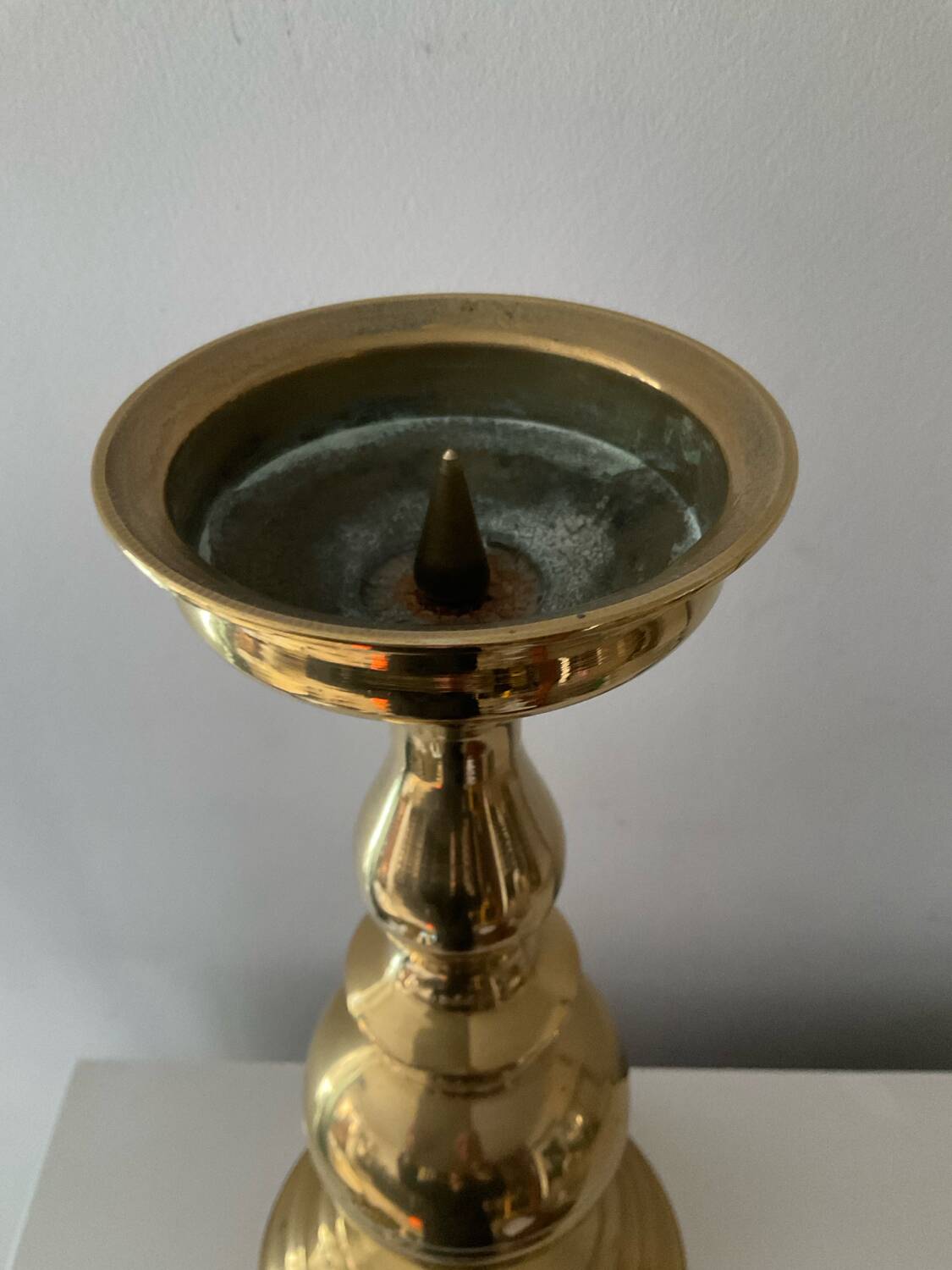 Antique candle holder in solid bronze