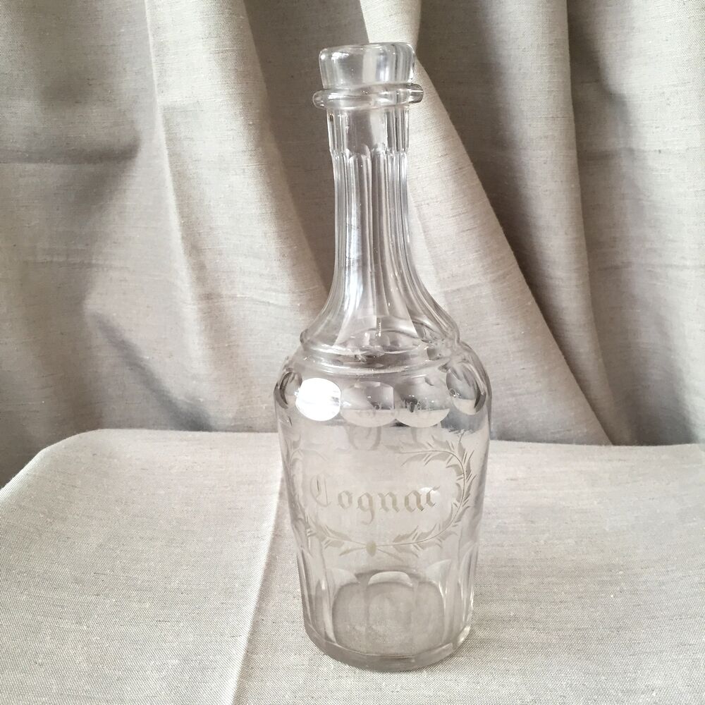 Bottle in gravel glass cognac of the years 1930