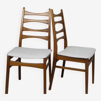 Pair of vintage teak chairs with white imitation leather tops Denmark