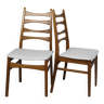 Pair of vintage teak chairs with white imitation leather tops Denmark