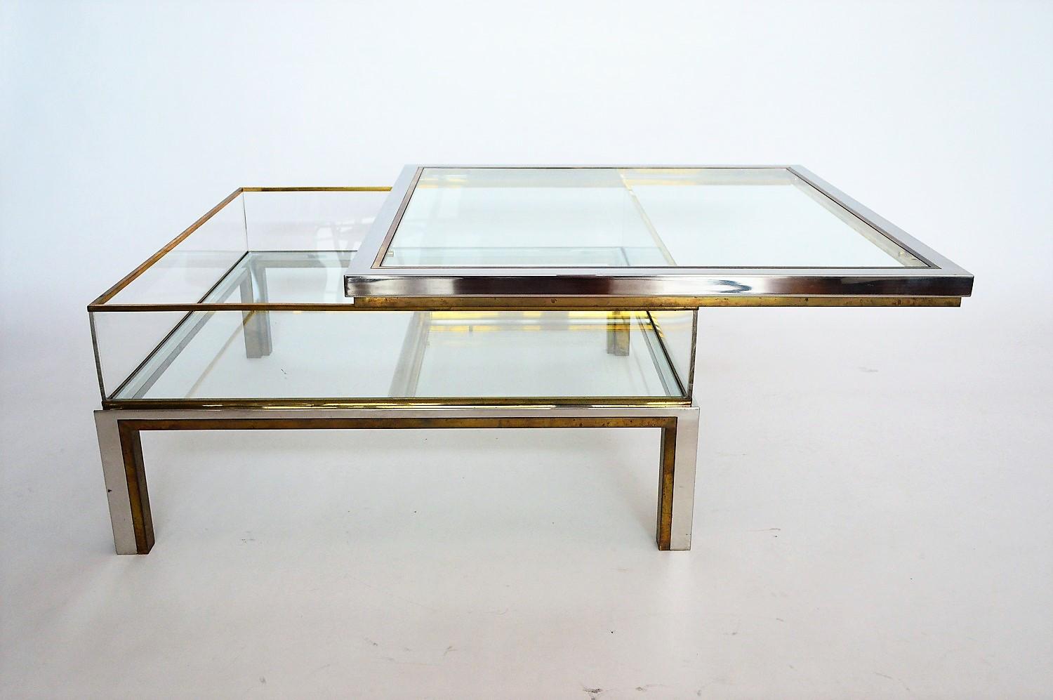 Coffee table in brass and chrome with folding top compartment to House Jansen 1970 s