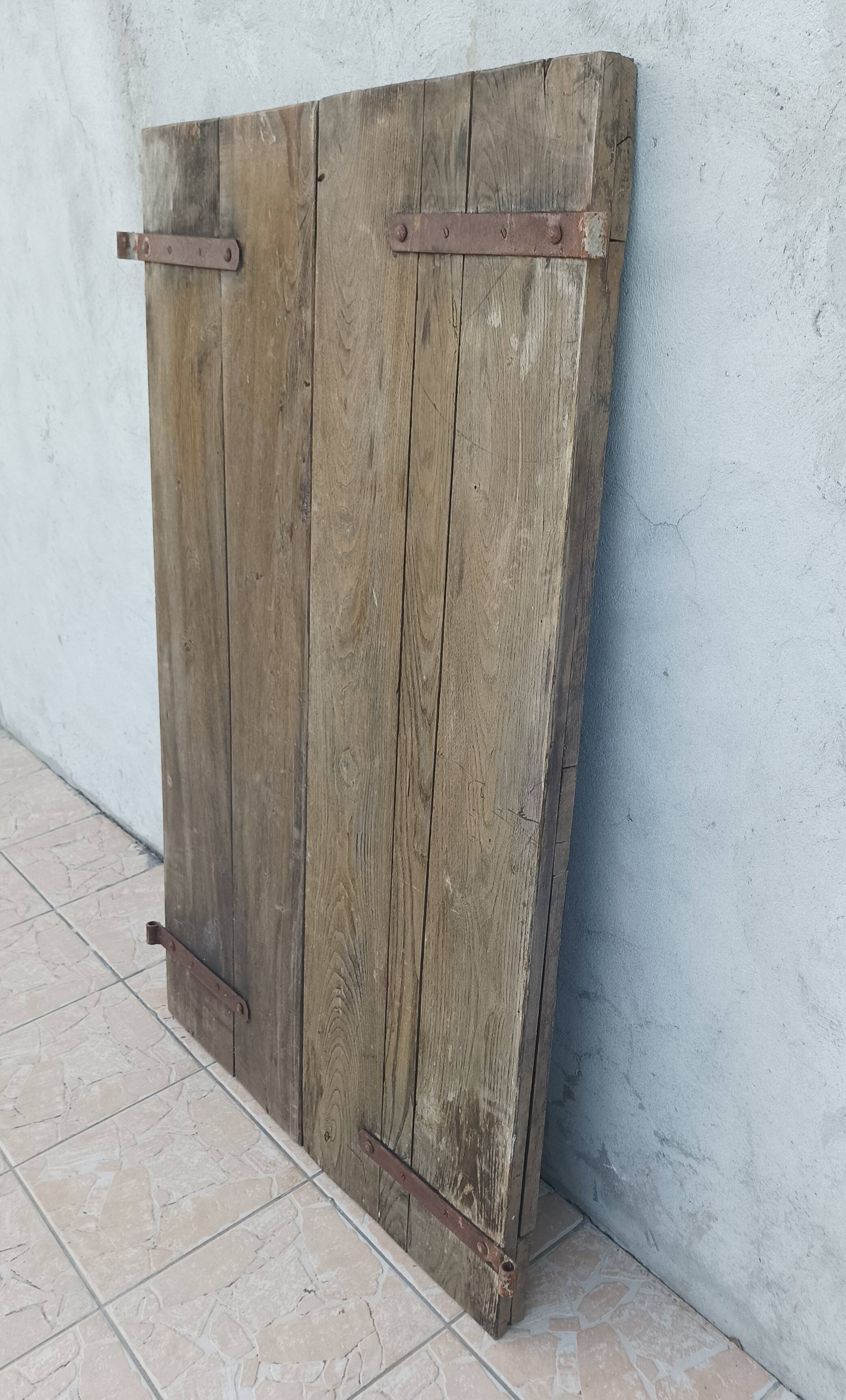 Pair of antique oak shutters