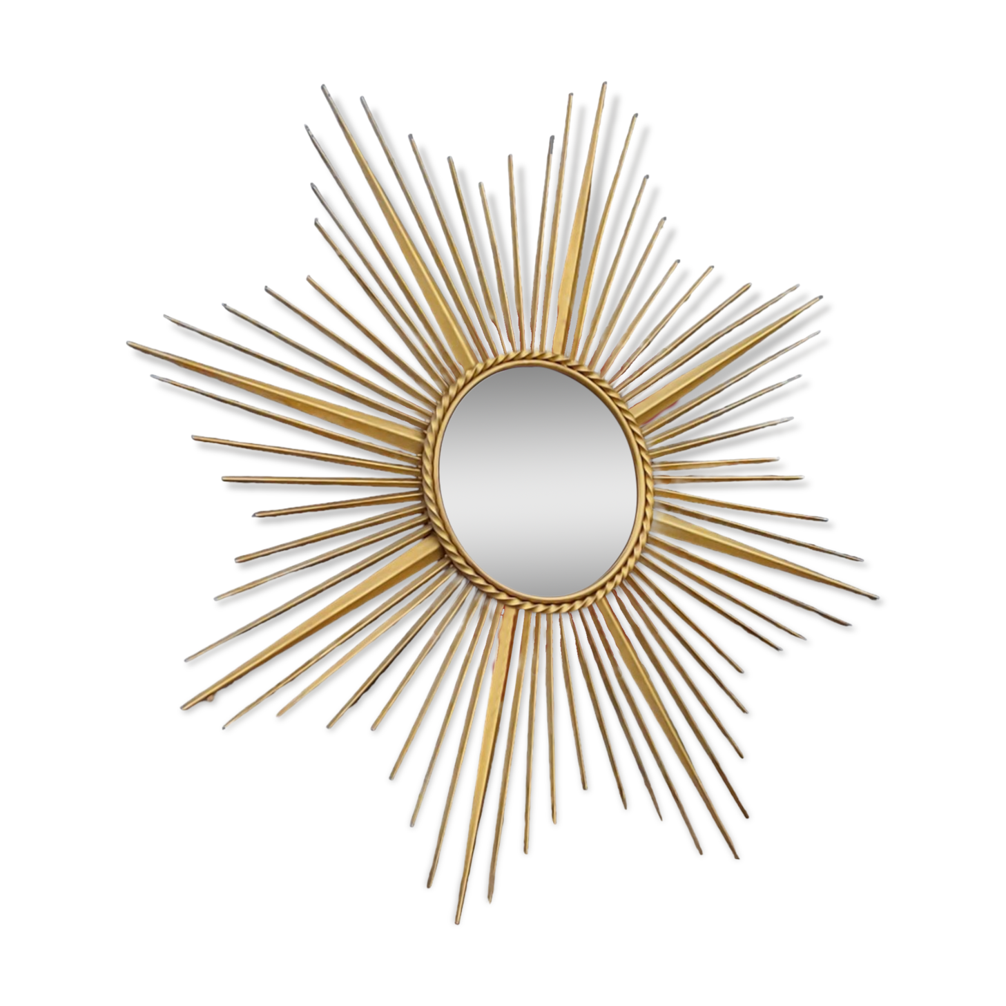 Miroir soleil Chaty Vallauris en métal doré