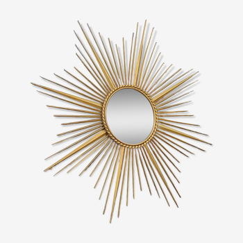 Miroir soleil Chaty Vallauris en métal doré